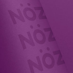 Close up of the bottle for NÖZ sunscreen in the color purple