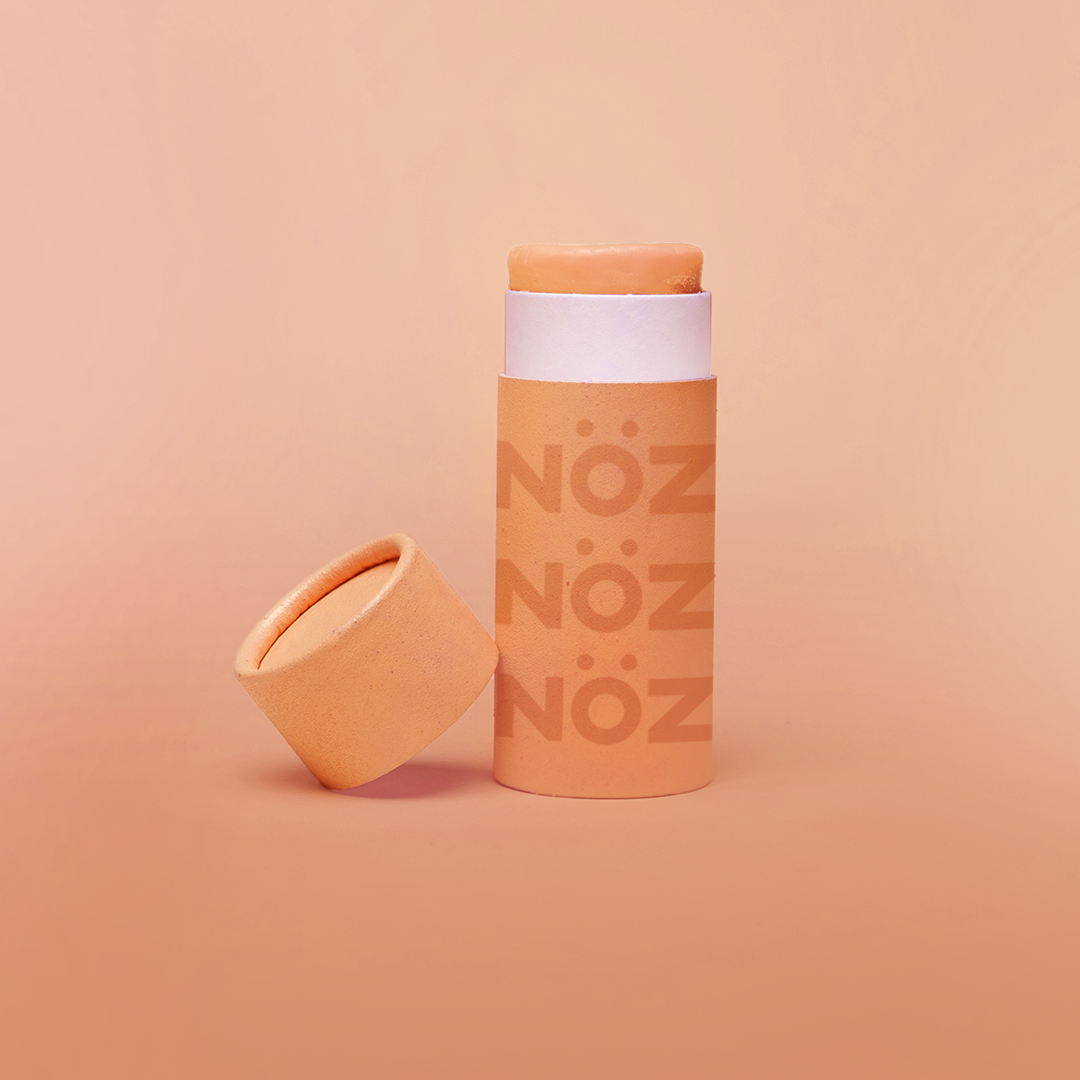 NÖZ stick sunscreen in the color orange